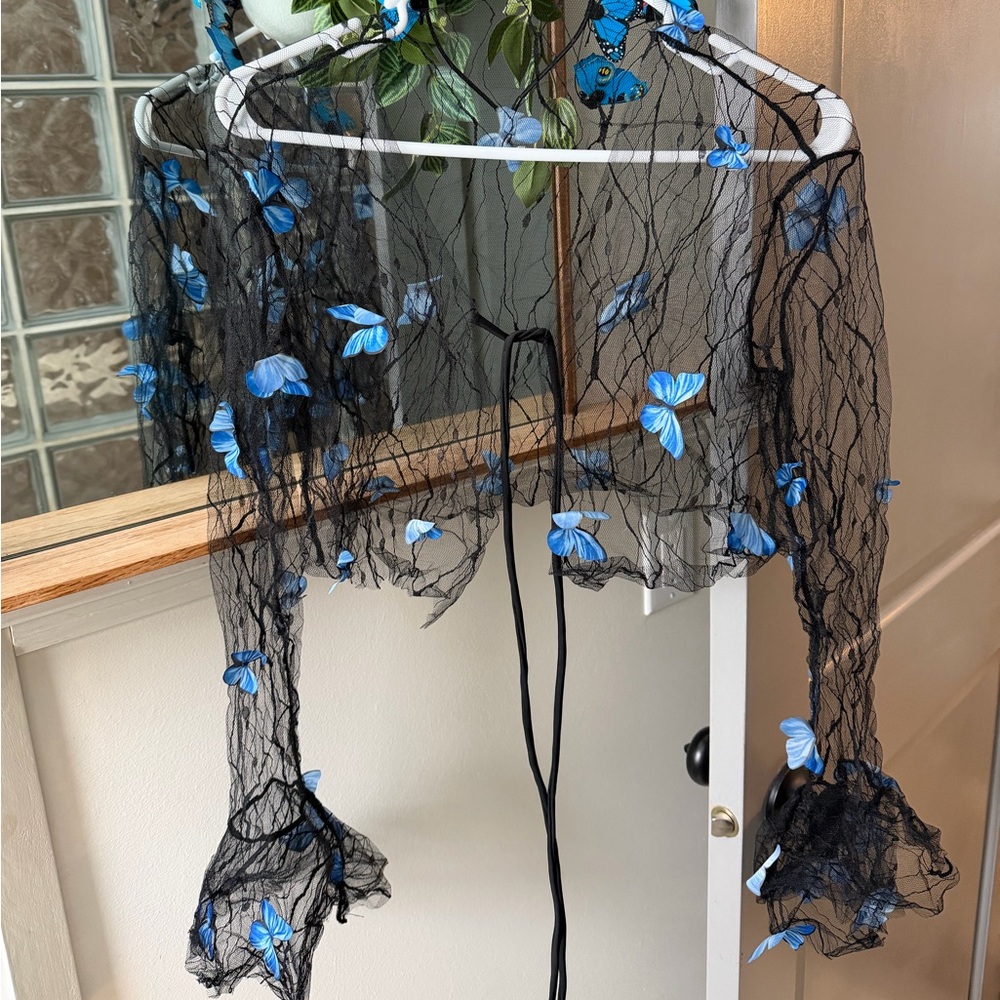 Sheer Black Top with Blue Butterfly Accents